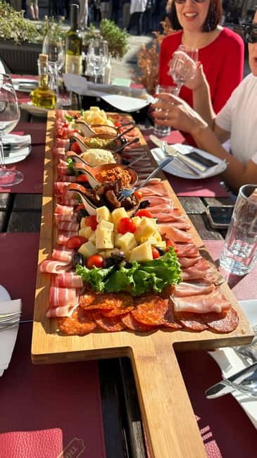 Kotor: Private Walking Tour with Wine and Food Tasting - Restaurant time: smoked ham, multiple spreads, and wine with a proper meal