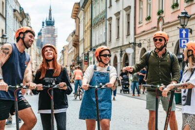 Krakow: Guided E-Scooter City Tour with Food Tastings - Meeting at Plac Szczepański 8: training, helmets, and first impressions