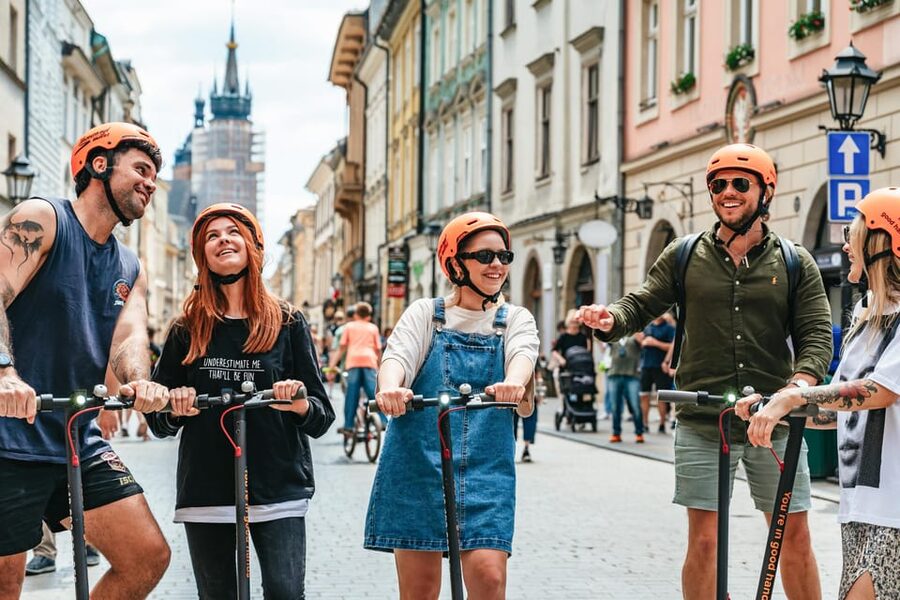 Krakow: Guided E-Scooter City Tour with Food Tastings - Meeting at Plac Szczepański 8: training, helmets, and first impressions
