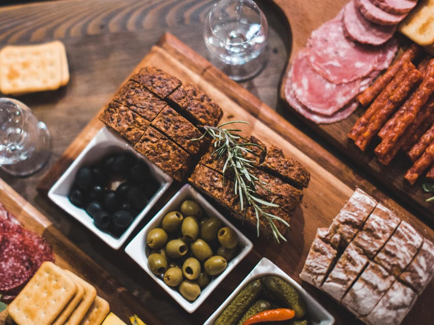 Krakow: Vodka Tasting Tour: Tapas, Tipsy Tales & Hidden Gems - The Start Bar: Tapas Boards and Two Clear Vodkas First