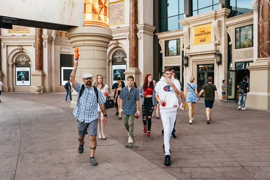 Las Vegas Strip: Foodie Walking Tour - Walking the Strip lights while the guide tells Sin City’s food story