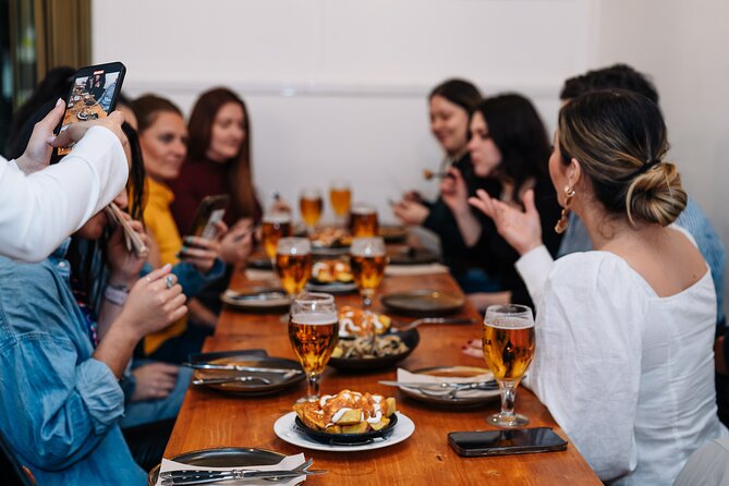 Lisbon: Award-Winning Guided Walking Food Tour with Local Drinks - Rua da Vitória: grilled sardines and the real-life job of vinho verde