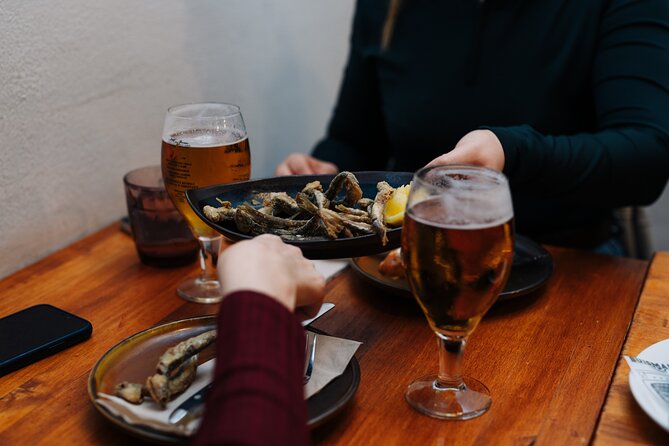 Lisbon: Award-Winning Guided Walking Food Tour with Local Drinks - Rua da Madalena: bifana street food and crisp comfort bites