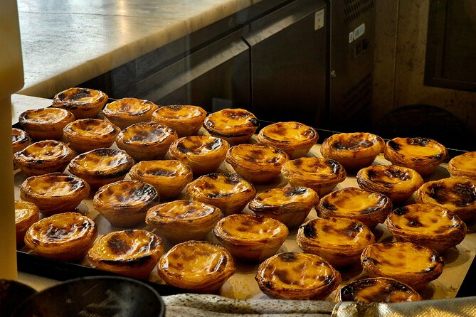 Lisbon Small-Group Food Tour: Eat & Drink Like a Local - Chouriço Assado and Red Wine: Smoke, Sausage, and Heat