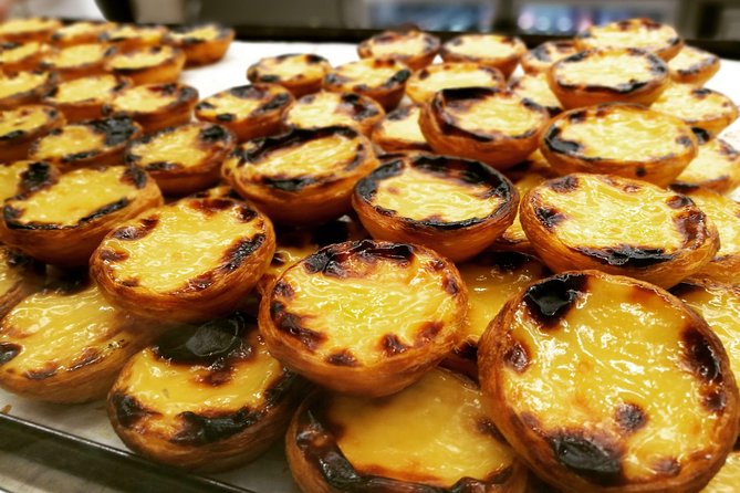Lisbon Small-Group Food Tour with 18 Tastings in Alfama District - Chafariz d’El Rei: history breaks between plates