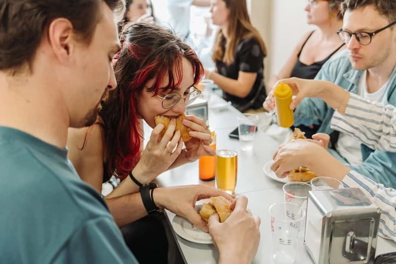 Lisbon: Tastes and Traditions Guided Food Tour - Salt cod comfort and alheira at a family-run Tasca