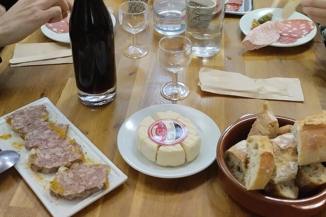 Lyon Sunset Food Tour – A Full Taste of France by Do Eat Better - Stop 2 at Place du Change: charcuterie and the trading-history story