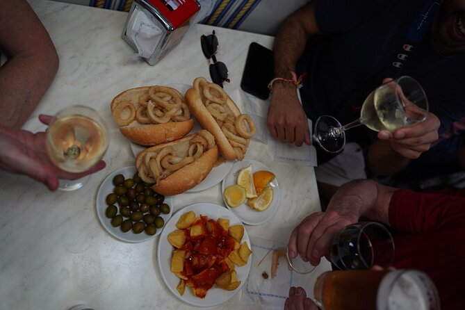 Madrid by Night: Tapas Crawl, Local Drinks & Hidden Gems - Stop 3: La Latina’s six-table tapas restaurant (small room, big flavor)