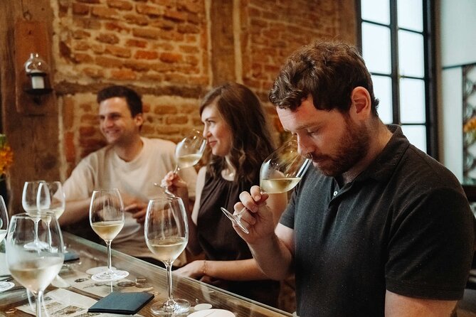 Madrid Evening Tapas and Wine Guided Tour - Muñiz: a beloved old tavern and the slow-cooked stew chance