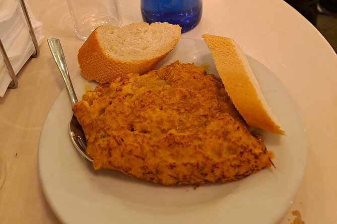 Madrid Food Tour: Tapas, Drinks and Delights with a Local - Plaza de Jacinto Benavente: potato tortilla that’s more than a side dish
