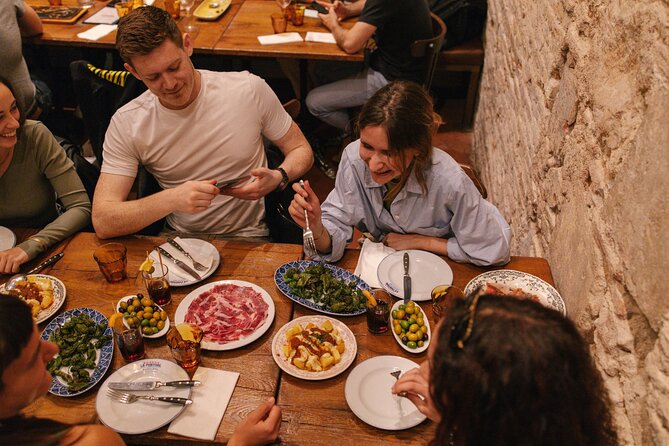 Madrid Food Walking Tour with Tapas and Vermouth - Plaza de la Cebada: award-winning omelette, goat cheese, and beer
