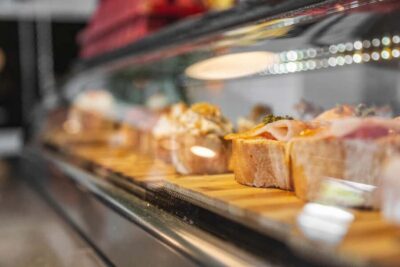 Madrid: Guided Food Tour with Authentic Tapas & Delicacies - What You Actually Eat: Squid Sandwich, Tortilla, Patatas Bravas, Manchego