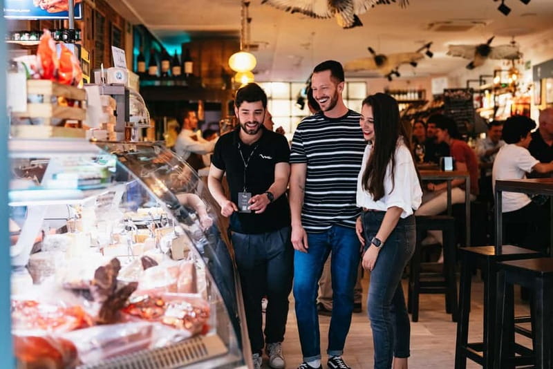Madrid: Guided Tapas and Wine Tour with Rooftop Views - Rooftop views and cava: the evening tour payoff