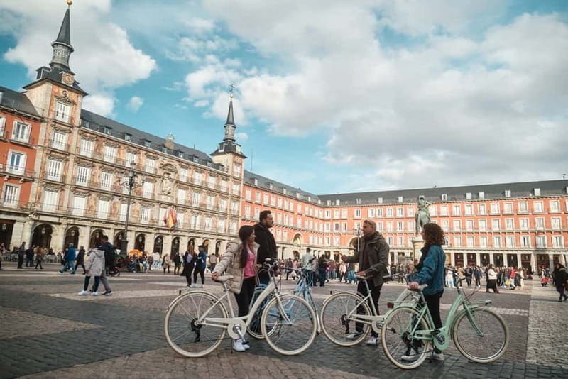Madrid: Highlights Guided Vintage Bike Tour and Tapas Option - Bikes, helmets, and the kind of comfort you should expect