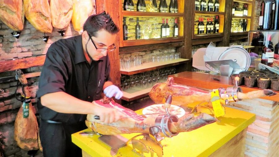 Madrid: Iberico Ham and Spanish Wine Small-Group Food Tour - Where Plaza Isabel II sets the tone for a Madrid food lesson