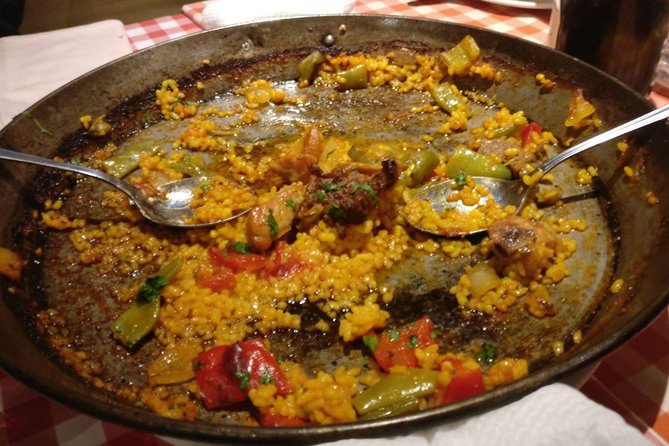 Madrid Local's Tapas Tour Dinner with a side of History - Plaza de Isabel II finish: paella dinner, sangria, and digestifs
