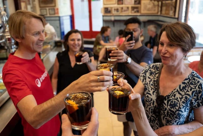 Madrid: Local Tapas, Drinks, and Hidden Gems Walking Tour - La Latina for Madroño liquor and chorizo: the neighborhood detour