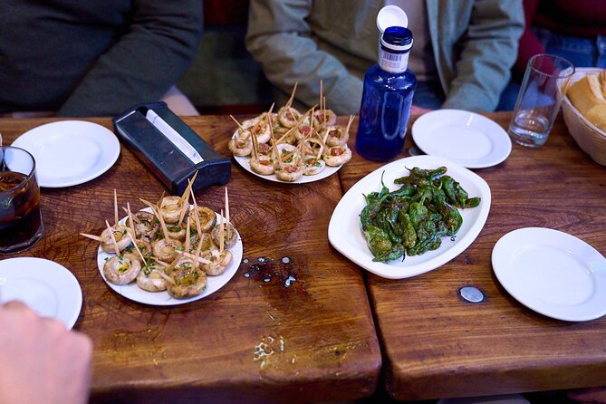 Madrid: Not Just Another Tapas & Wine Tour by Eating Europe - Calle Mayor to the classic tavern rhythm: where the tastings live