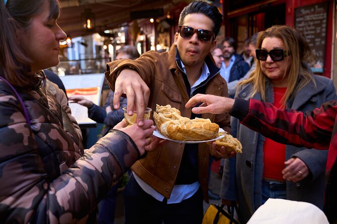 Madrid: Not Just Another Tapas & Wine Tour by Eating Europe - Mercado de San Miguel to Puerta del Sol: the street-walk payoff
