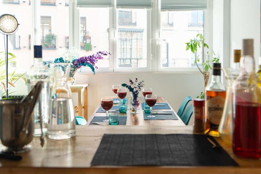 Madrid: Paella and Sangria Workshop with Tapas - Hosts, languages, and the vibe: from Jesus and Toni to Paulo and more
