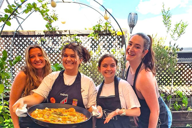 Madrid: Paella & Sangria Classes- Seafood, Chicken & Vegan option - Tapas stop: tortilla de patatas and ham toast with tomato