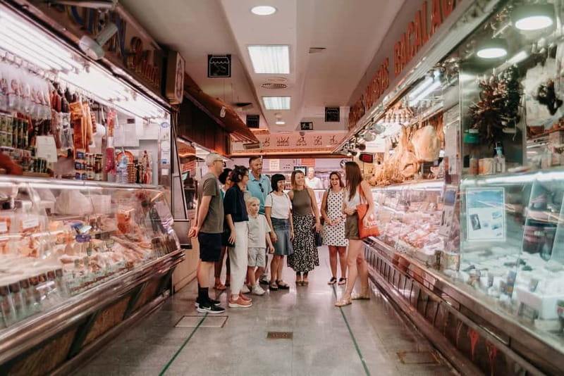 Madrid: Paella & Tapas Cooking Class and Market Visit - Croquetas and Patatas Bravas: The Tapas That Teach Core Skills