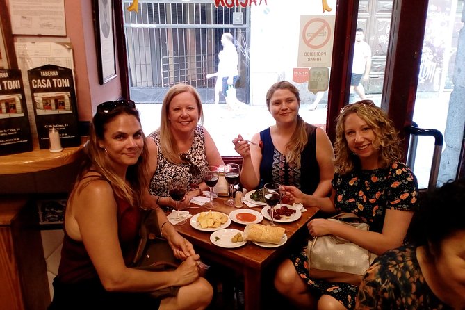 Madrid Tapas & Drinks: A Small Group Culinary Adventure - Tablao Flamenco Arco de Cuchilleros area: mushrooms, squid, and an old-food legend