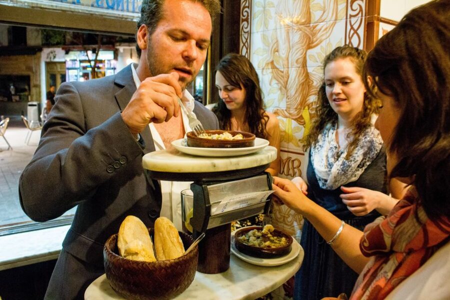 Madrid: Tapas & Wine Tasting Tour with Local Guide - Entering tapas mode at Santa Ana (Lorca statue to the first bar)