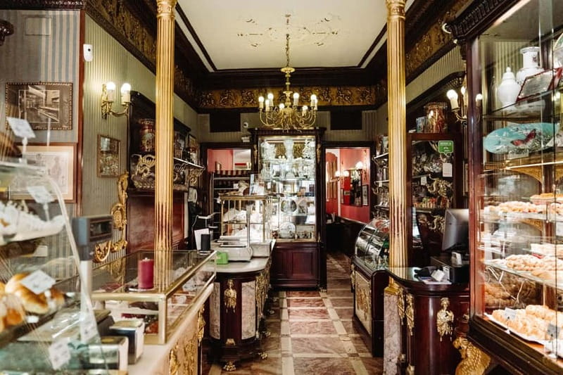 Madrid: Ultimate Food Tour of Local Markets & Tapas - Mercado de Antón Martín: Olives, Cured Meats, Olive Oil, and Vermouth