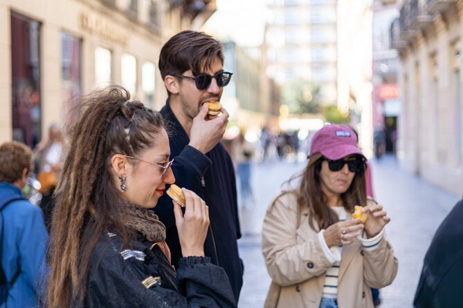 Malaga Food Tour with 12+ Tastings: Tapas, Olive Oil, Ham & More - Drinks: vermut, wine, beer, and staying comfortable