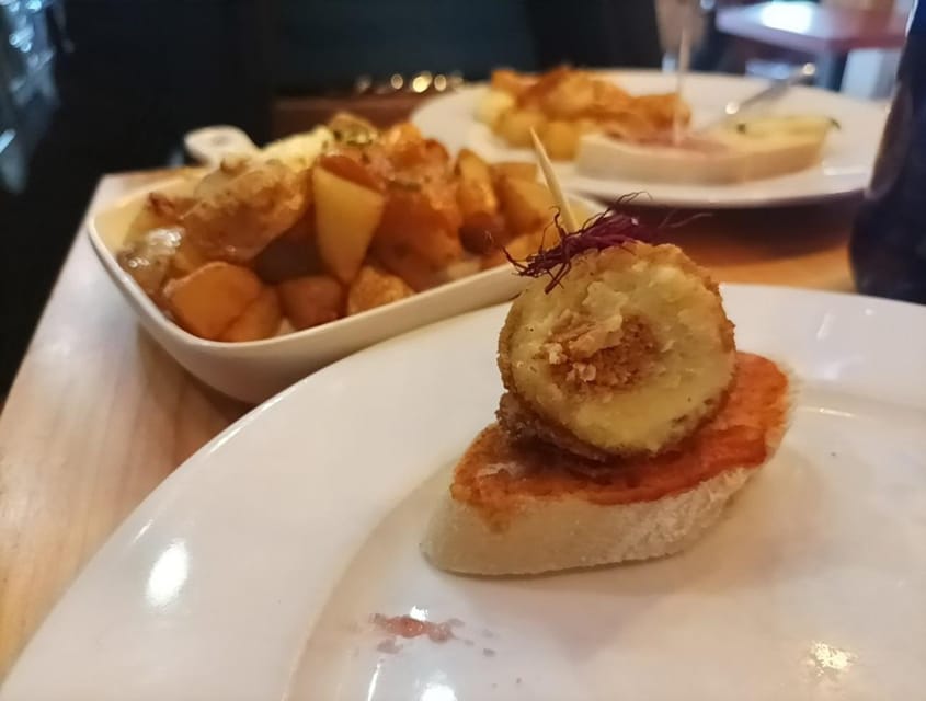 Malaga: Food Tour with Local Guide, Tapas, and Drinks - Meat You’ll Remember: Carrillada and Chivo Malagueño