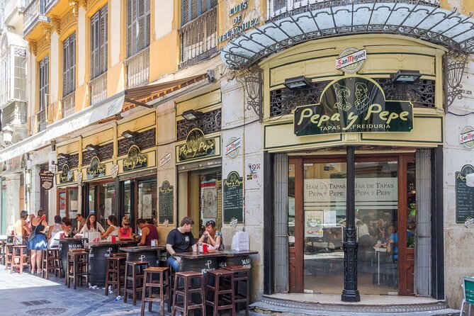 Malaga Market Food Tour: Tapas, Drinks, and Local Flavors - Stop 4: Plaza de la Merced and Andalusian tapas with a drink