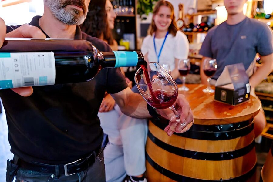 Malaga: Wine and Tapas Tour with Tastings and Drinks - First Tapas Stop: Traditional Bar Bites + Culture Talk