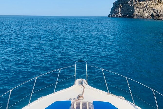 Mallorca Beach & Caves 4hr Boat Trip Drinks, Tapas, SUP & Snorkel - Leaving Port d’Alcúdia and heading for Coll Baix
