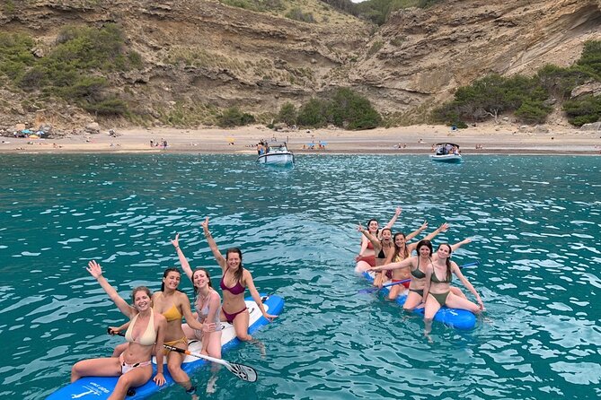 Mallorca Beach & Caves 4hr Boat Trip Drinks, Tapas, SUP & Snorkel - Alcanada Lighthouse area: snacks, drinks, and a slower finish