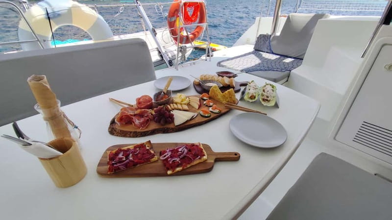 Mallorca: Catamaran Boat Tour with Tapas - Tapas and drinks onboard: food that fits the sea-day pace