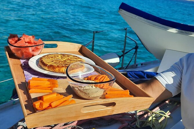 Mallorca Sailing Adventure with Snorkeling, Snacks & Drinks - Snacks and drinks: two drinks plus real boat-food convenience