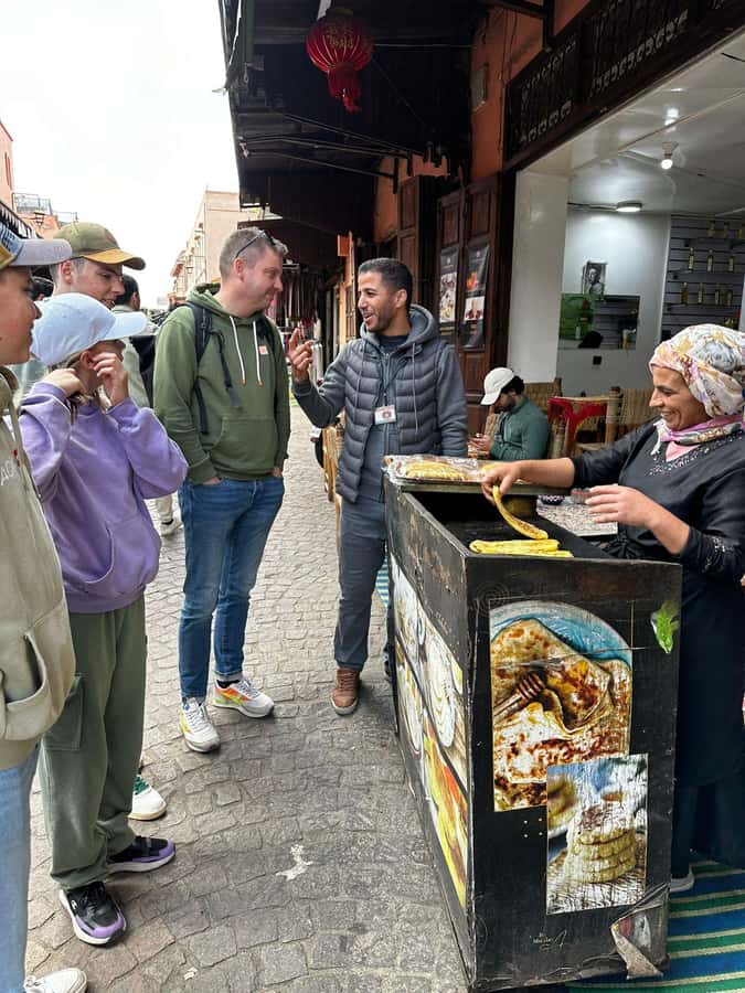 Marrakech: Street Food Tour with a Local Guide - Mellah: photo stop, snacks, and a different side of town