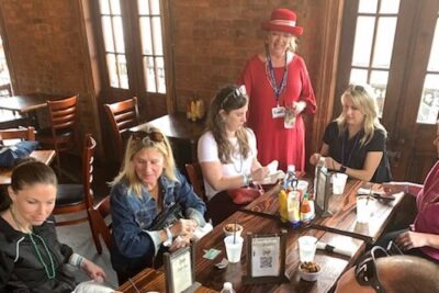 New Orleans Sunset Food Tour Experience - Meeting at 816 Decatur St, then heading to a private dining area (stairs included)