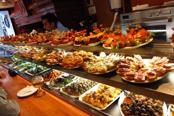 Night Tapas Walking Tour in Barcelona Modernist Area with Small Group and Dinner - Stop 2: Passeig de Gràcia pintxos for northern Spain flavor