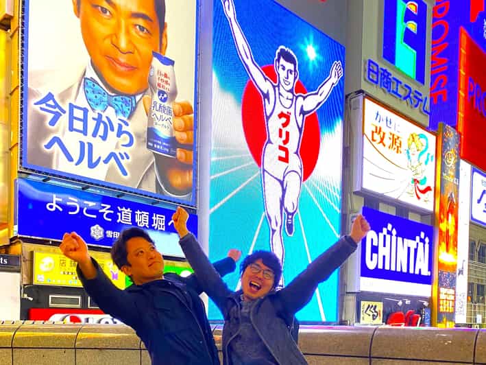 Osaka: 2-Hour Local Street Food Tour – Dotonbori & Namba - Glico Man Sign: the fastest way to get oriented in Dotonbori