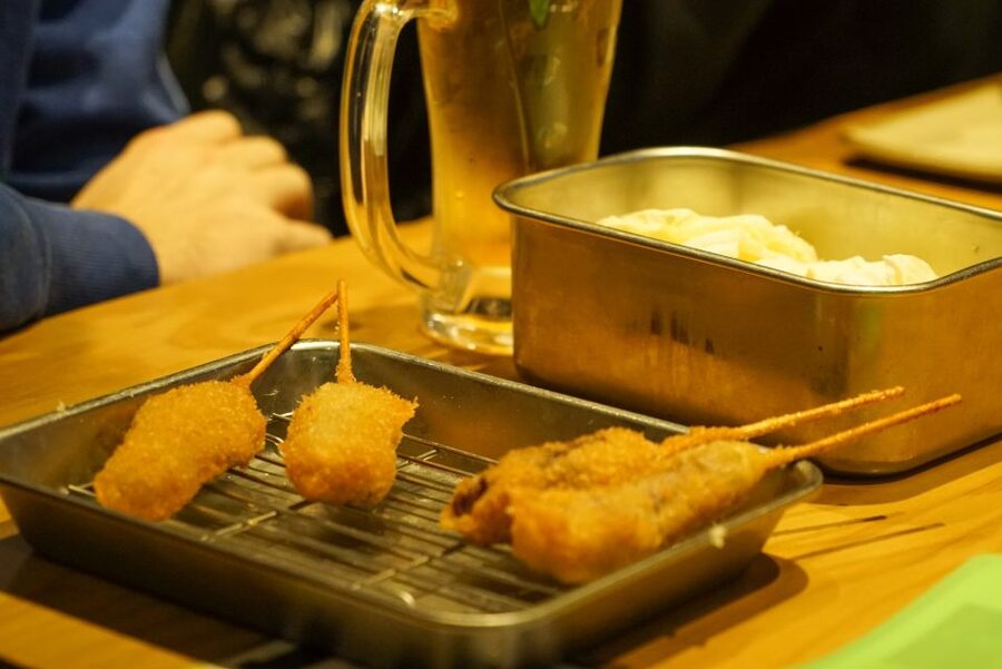 Osaka: Local Foodie Tour in Dotonbori and Shinsekai - Shinsekai Walk: Kushikatsu in the Old District Mood
