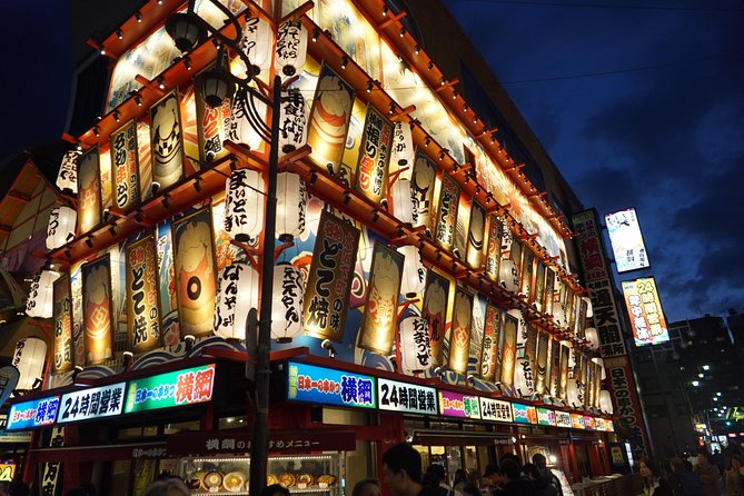 Osaka Local Foodie Walking Tour in Dotonbori and Shinsekai - The Glico Sign photo moment: quick, iconic, done right