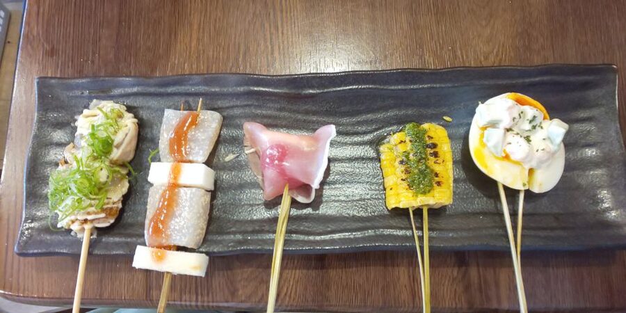Osaka: Shinsekai Food Tour with 13-15 Dishes at 5 Eateries - Cozy Traditional Stop: Nikudofu, Beef-Tofu Stew, Mochi, And A Drink