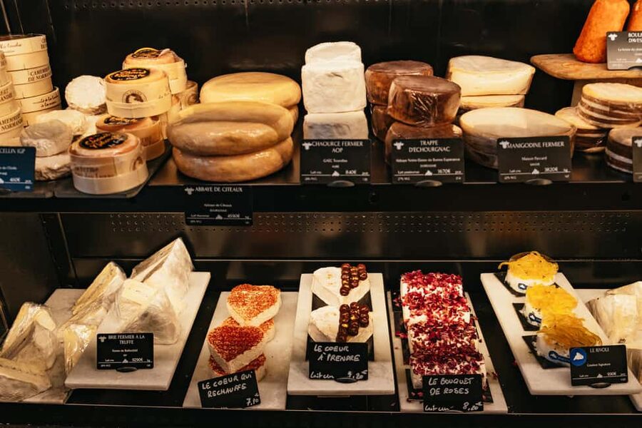 Paris: Gourmet Food Tour with Over 10 Tastings and Wine - Macarons and the Meilleur Ouvrier de France Detail That Adds Context