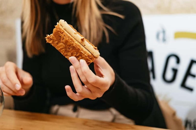 Paris: Saint Germain des Prés Guided Foodie Walking Tour - Savory bites: cheese and wine, plus a palace-chef prepared dish
