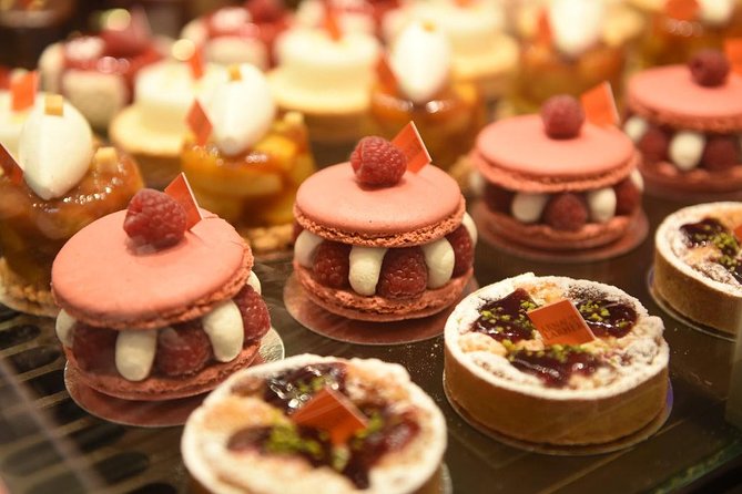 Paris Saint-Germain French Gastronomy Tasting Food Tour - How the route flows: outside churches, then artisan stops