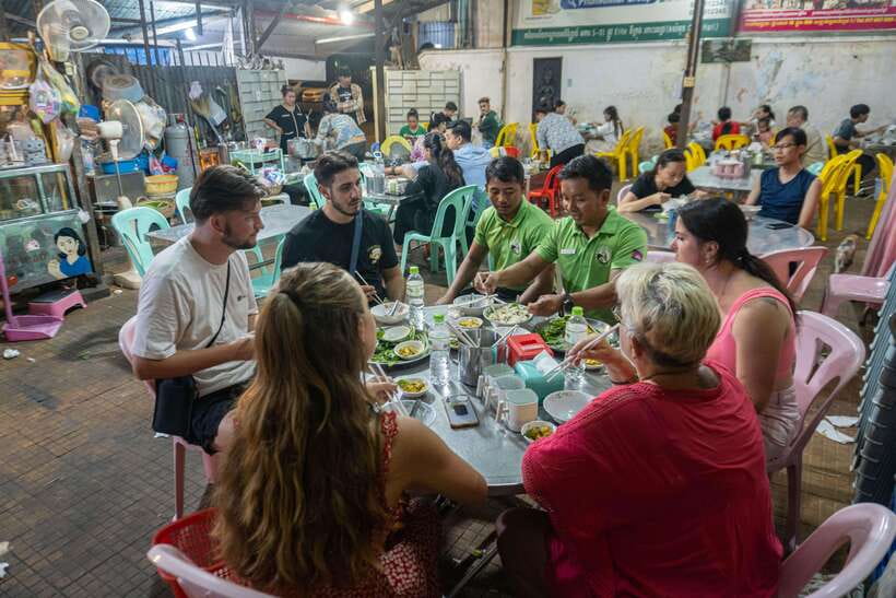 Phnom Penh Night Foodie Vespa Tour / Tuk Tuk Available - Phnom Penh after dark from a vintage Vespa or Tuk Tuk