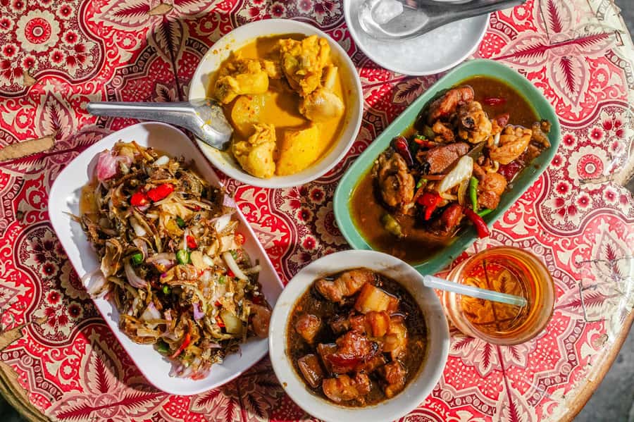 Phuket: Baba Tastes Food Tour with 15+ Tastings - Phuket Old Town at dusk: why this timing works