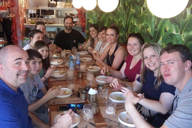 Polanco Food Tour: The Bestselling Food Adventure in Mexico City - Polanco walking scenery: parks and mansions, not just food storefronts